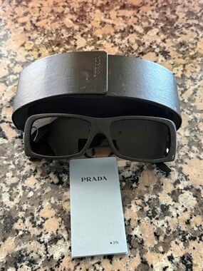 Prada Black Sunglasses with Silver Logo Accents
